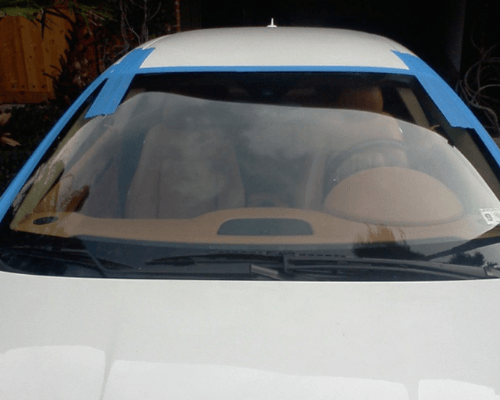 blue tape on windshield in mcallen tx